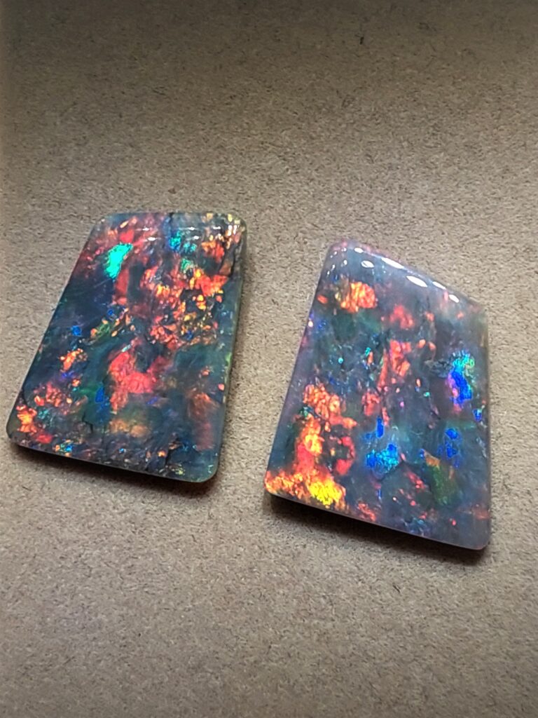 Semi Black Opal pair (11 carats)